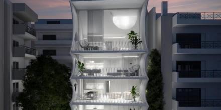 exterior view of elegant apartment complex for residency by night
